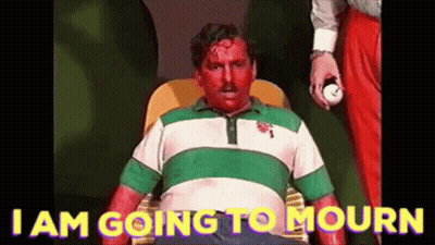 A Man With Blood On His Face Is Sitting In A Chair With The Words I Am Going To Mourn On The Bottom . GIF