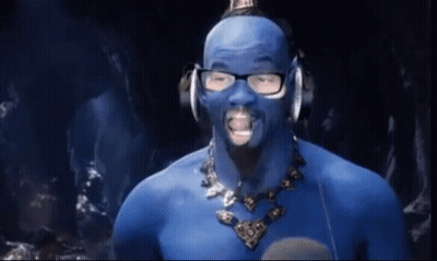 A Man With Blue Paint On His Face And Glasses GIF