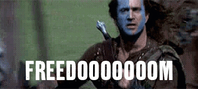 A Man With Blue Paint On His Face Is Holding A Sword And The Word Freedom Is On The Screen . GIF