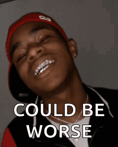 A Man With Braces On His Teeth Is Smiling With The Words " Could Be Worse " Below Him GIF