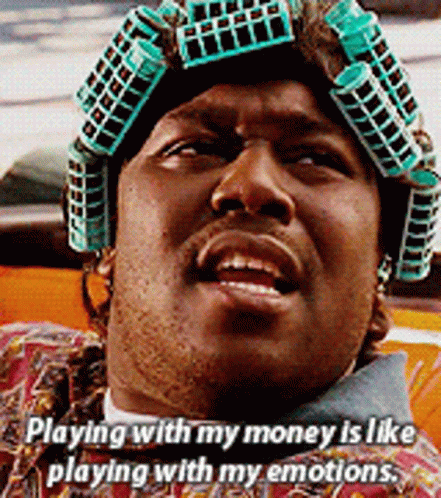 A Man With Curlers On His Head Says That Playing With His Money Is Like Playing With His Emotions GIF