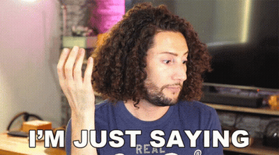 A Man With Curly Hair And A Beard Is Saying I 'M Just Saying GIF