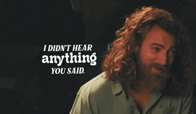 A Man With Curly Hair And A Beard Says I Did N't Hear Anything You Said GIF