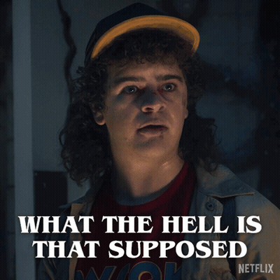 A Man With Curly Hair And A Hat Says What The Hell Is That Supposed GIF