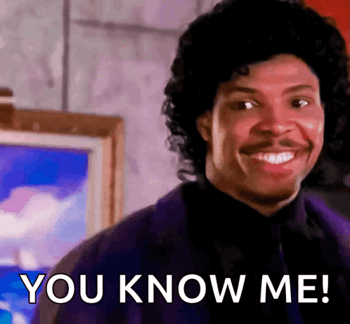 A Man With Curly Hair And A Mustache Is Smiling And Says " You Know Me " GIF
