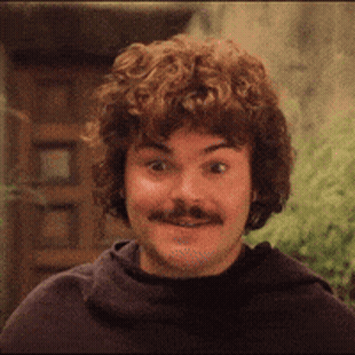 A Man With Curly Hair And A Mustache Is Wearing A Black Shirt GIF