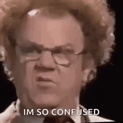 A Man With Curly Hair And Glasses Is Making A Funny Face . GIF
