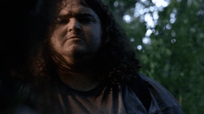 A Man With Curly Hair Is Smiling With The Words I Want Some Friggin Written Below Him GIF
