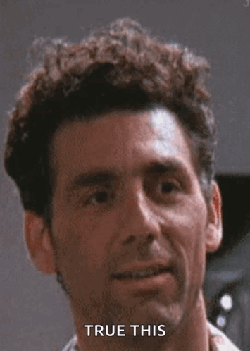 Curly-Haired Man Smiling With True This Text GIF
