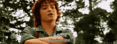 A Man With Curly Hair Is Standing In Front Of Trees And Says Andre You 'Re Late . GIF