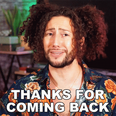 A Man With Curly Hair Is Wearing A Floral Shirt That Says Thanks For Coming Back GIF