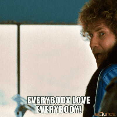 A Man With Curly Hair Says " Everybody Love Everybody " In Front Of A Window GIF