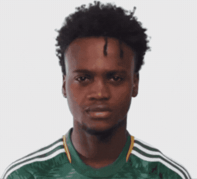 A Man With Curly Hair Wearing A Green Adidas Shirt GIF