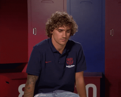 A Man With Curly Hair Wearing A Rakuten Polo Shirt GIF