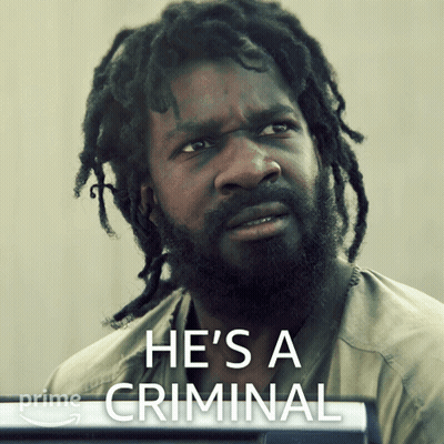 A Man With Dreadlocks And The Words He 'S A Criminal On The Bottom GIF