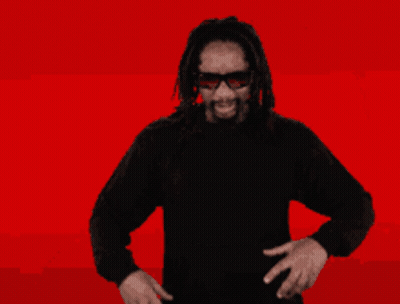 A Man With Dreadlocks Has The Word Ok In Front Of His Mouth GIF