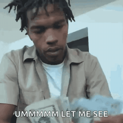 A Man With Dreadlocks Is Holding A Bunch Of Money And Says `` Ummmmm Let Me See '' . GIF