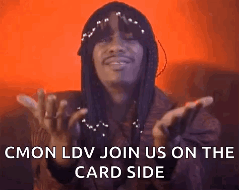 A Man With Dreadlocks Is Making A Funny Face And Says `` Cmon Ldv Join Us On The Card Side '' GIF