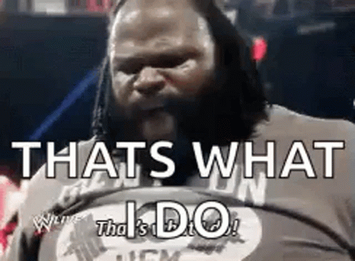A Man With Dreadlocks Is Sitting In A Wrestling Ring With The Words `` That 'S What I Do '' . GIF