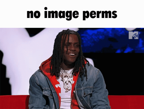 A Man With Dreadlocks Is Sitting On A Red Couch With The Words " No Image Perms " Above Him GIF