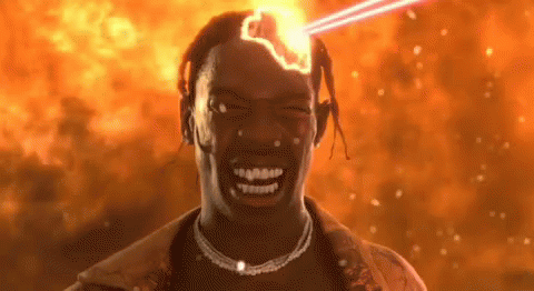A Man With Dreadlocks Is Smiling In Front Of A Fire And A Laser Beam Coming Out Of His Head . GIF