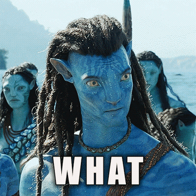 A Man With Dreadlocks Is Standing In Front Of A Group Of People And The Word What Is On The Bottom Right GIF