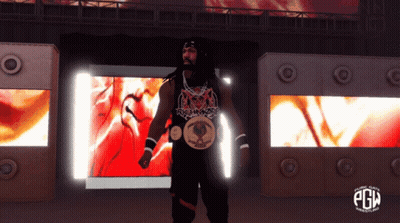 A Man With Dreadlocks Is Standing In Front Of A Screen That Says Pgm On It GIF