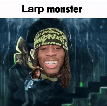 A Man With Dreadlocks Is Wearing A Beanie And Smiling With The Words Larp Monster Above Him . GIF