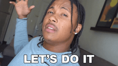 A Man With Dreadlocks Says Let 'S Do It With His Hands In The Air GIF