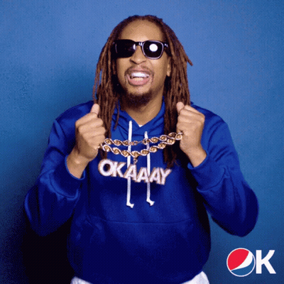 A Man With Dreadlocks Wearing A Blue Hoodie That Says Okay GIF