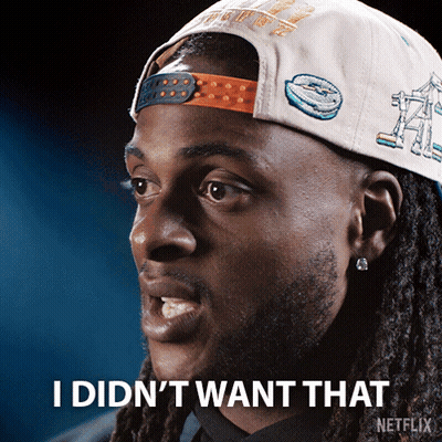 A Man With Dreadlocks Wearing A Hat That Says I Did N't Want That On It GIF