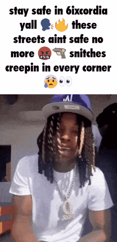 A Man With Dreadlocks Wearing A White Shirt And A Blue Hat Says Stay Safe In 6Ixcordia GIF