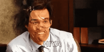 A Man With Duct Tape On His Face Is Smiling And Says Hiya GIF