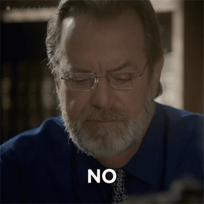 A Man With Glasses And A Beard Has The Word No On His Face GIF