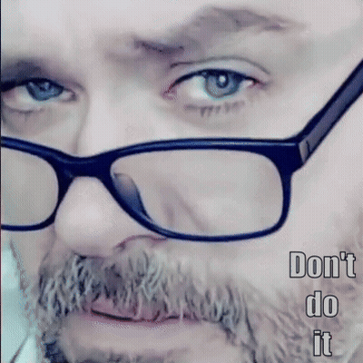A Man With Glasses And A Beard Has The Words " Do N't Do It " Below Him GIF