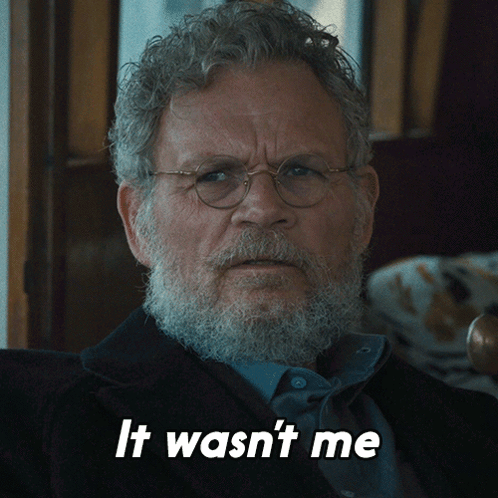 A Man With Glasses And A Beard Has The Words It Wasn 'T Me Below Him GIF