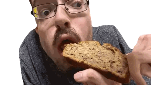 A Man With Glasses And A Beard Is Eating A Slice Of Banana Bread Sticker