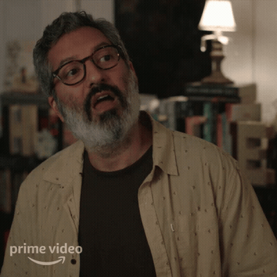 A Man With Glasses And A Beard Is Featured On A Prime Video Ad GIF