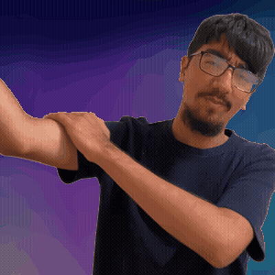 a man with glasses and a beard is holding his arm up