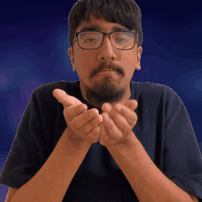A Man With Glasses And A Beard Is Holding His Hands Together In Front Of His Face GIF
