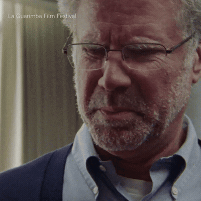 A Man With Glasses And A Beard Is In A La Guarimba Film Festival GIF