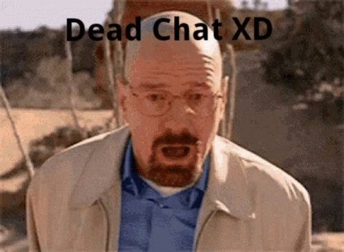 A Man With Glasses And A Beard Is Making A Funny Face And The Words Dead Chat Xd Are Above Him GIF