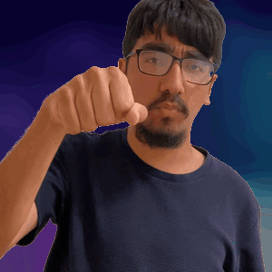 A Man With Glasses And A Beard Is Pointing His Finger GIF