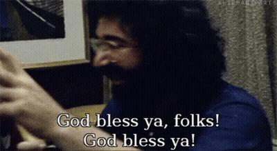 A Man With Glasses And A Beard Is Saying God Bless Ya Folks GIF