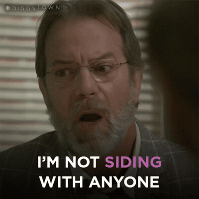 A Man With Glasses And A Beard Is Saying I 'M Not Siding With Anyone GIF