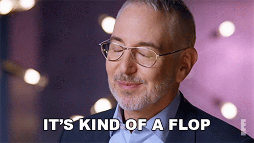 A Man With Glasses And A Beard Is Saying It 'S Kind Of A Flop GIF