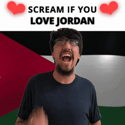A Man With Glasses And A Beard Is Screaming In Front Of A Flag That Says Scream If You Love Jordan GIF