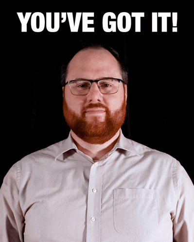 A Man With Glasses And A Beard Is Standing In Front Of A Black Background That Says You 'Ve Got It GIF