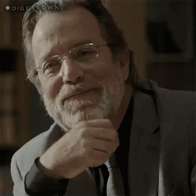 A Man With Glasses And A Beard Is Thinking GIF