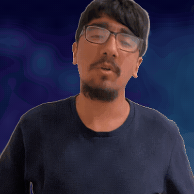 A Man With Glasses And A Beard Is Wearing A Black Shirt GIF